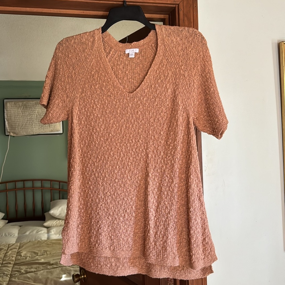 Rust colored sweater. New, worn once. 62% cotton, 38% acrylic
